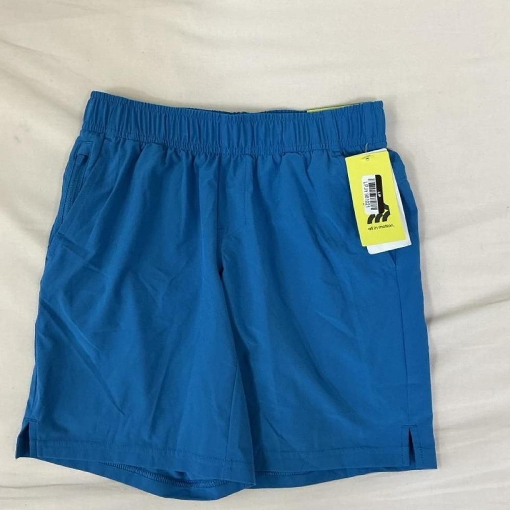 New with tags All in Motion boys active woven shorts in a bright blue color.